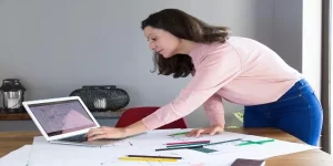 an young professional is working on Fixing Cumulative Layout 