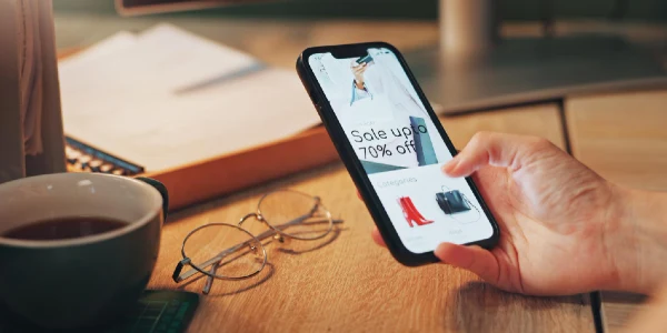 Phone screen hand and person with online shopping in home for sale promotion or discount tech subscription