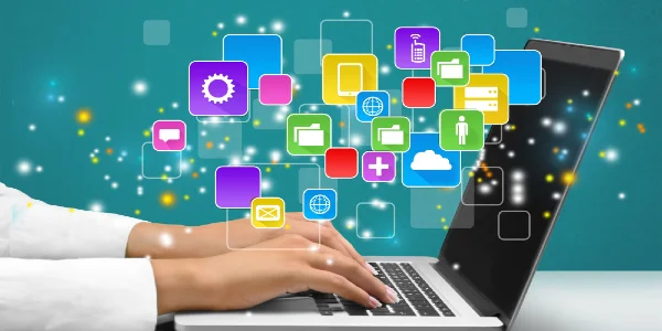 Woman working with laptop on blurred background, close-up